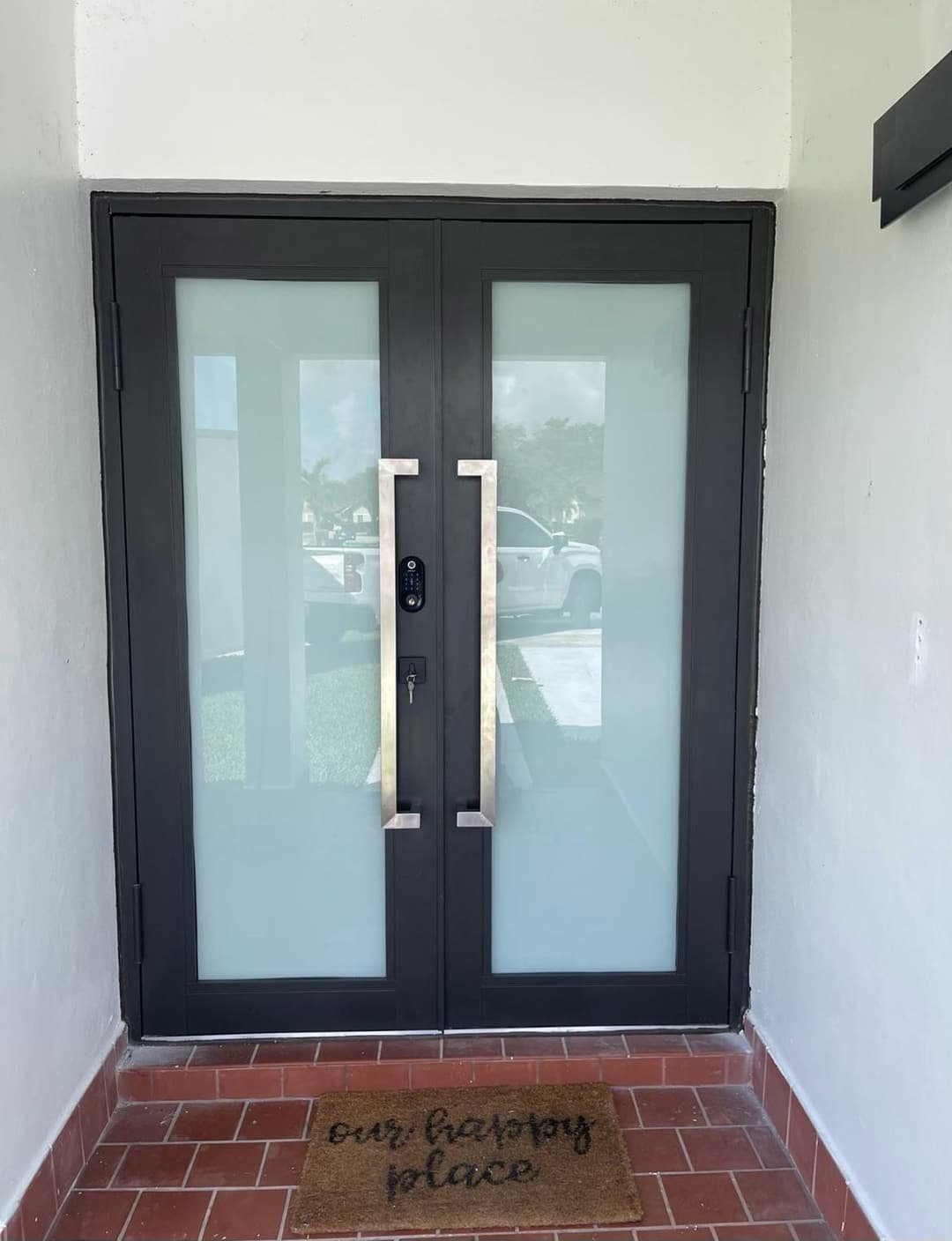 Smart impact double doors installed by ALCON