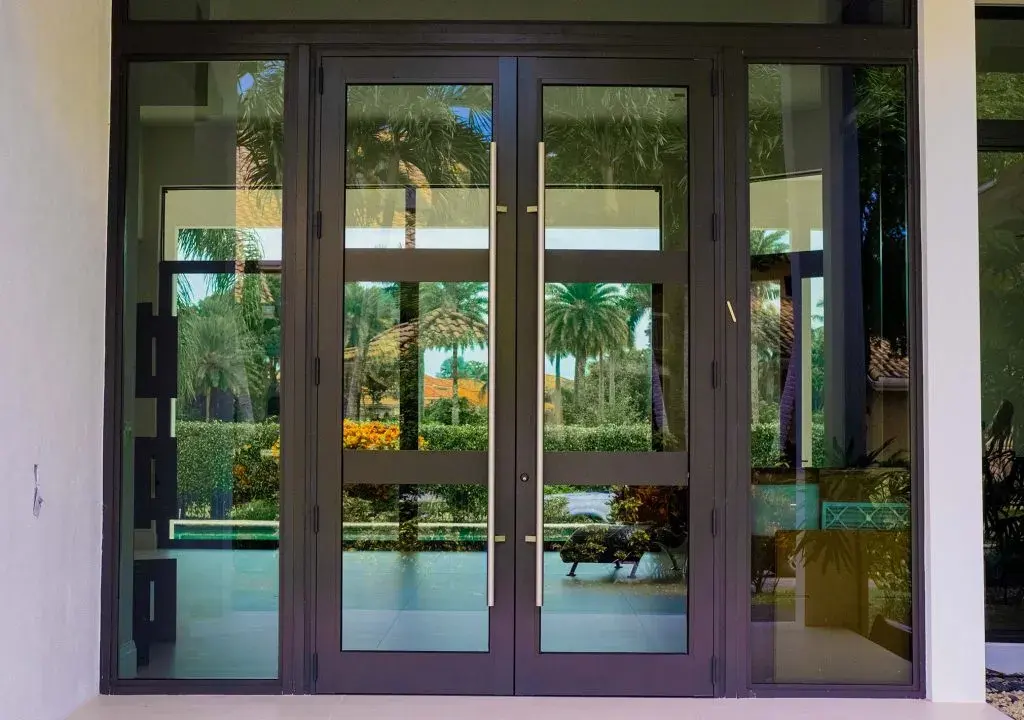 Hurricane-rated impact double doors installed by ALCON in South Florida