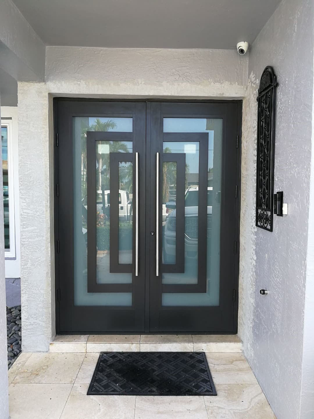 Hurricane-rated impact entry door installed by ALCON in South Florida